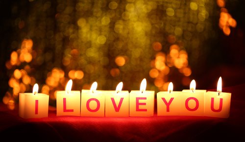 Valentine's Day candles showing 'I LOVE YOU"