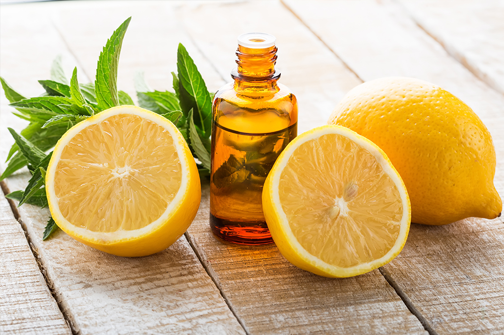 Sweet lemon oil bottle with lemons
