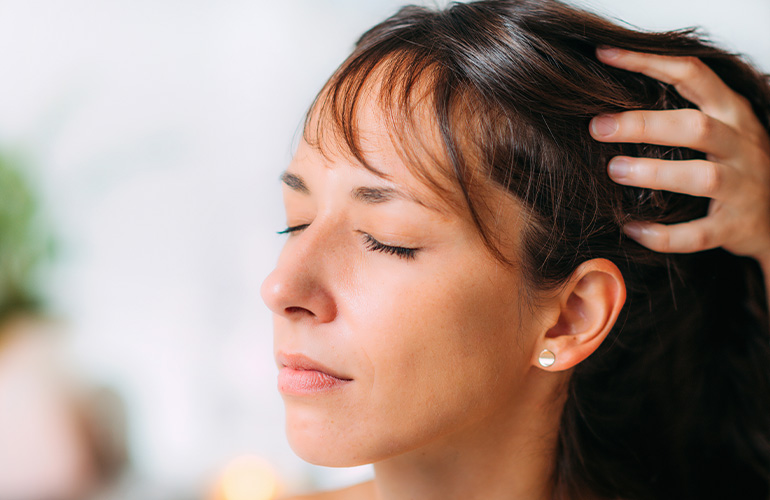 woman getting head massage